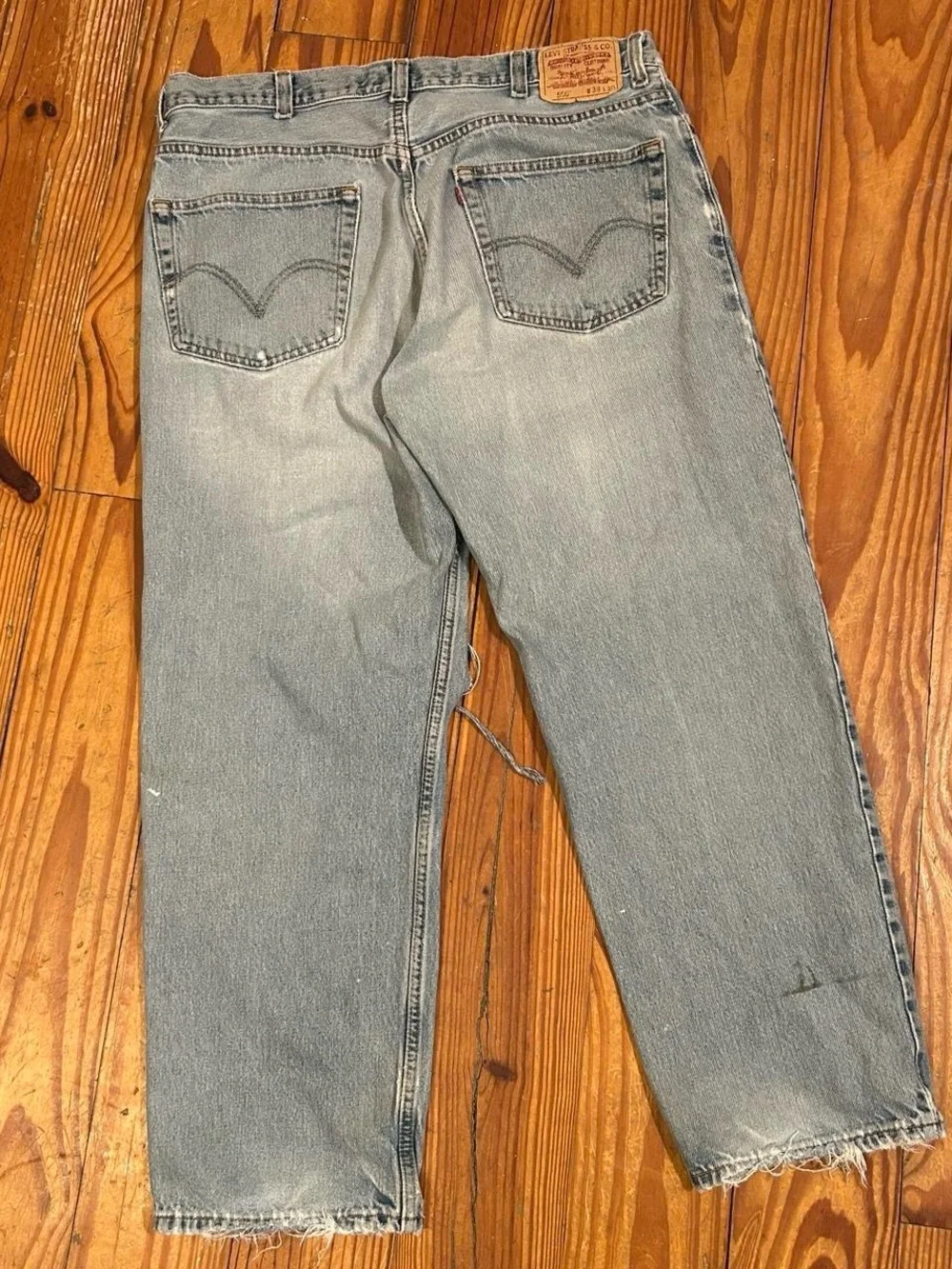 Vintage Levi's Light Blue Distressed Thrashed Relaxed Fit Jeans